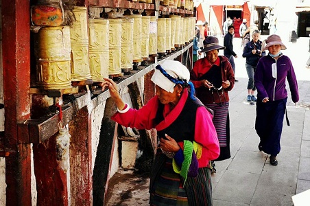 Believer Turning the Praying Wheel.jpg